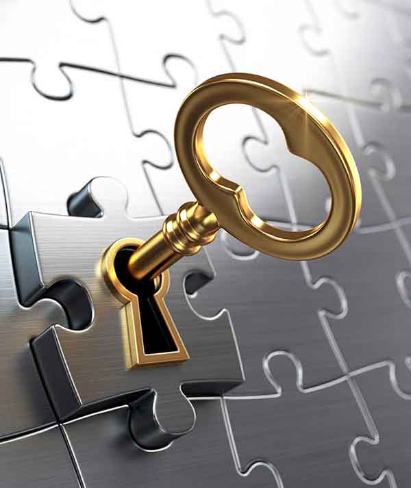 Woman selects a key from a Key Box System