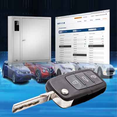 automotive-dealership-key-management-systems Woman selects a key from a Key Box System